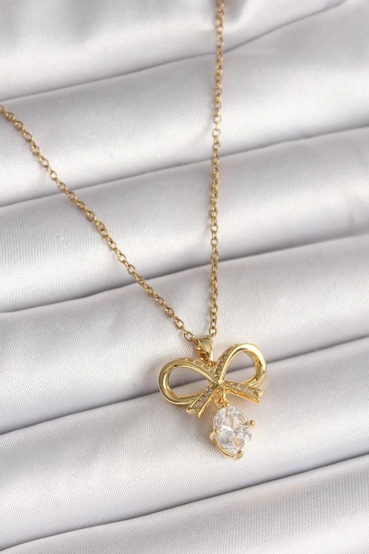 316L Çelik Gold Renk Zincir Zirkon Taşlı Kurdele Model Kadın Kolye