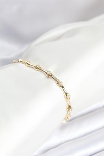 Pirinç Gold Renk Kemik Model Zirkon Taşlı Kadın Bileklik